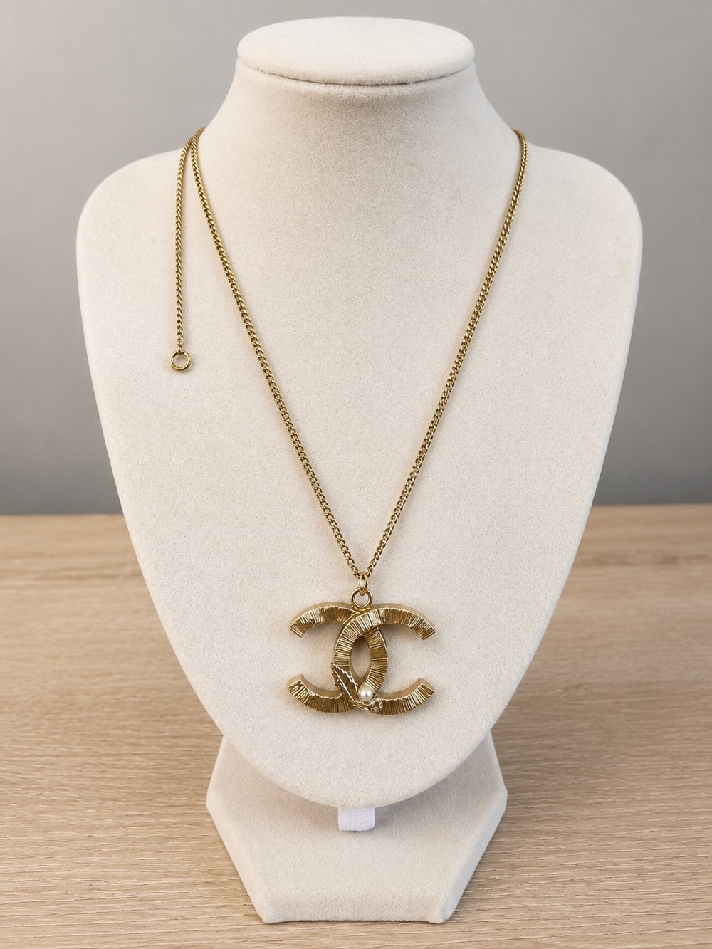 CHANEL Gold-Tone Textured Interlocking CC Pendant Necklace